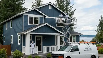 Professional house painters in Seattle WA applying exterior paint to a residential home